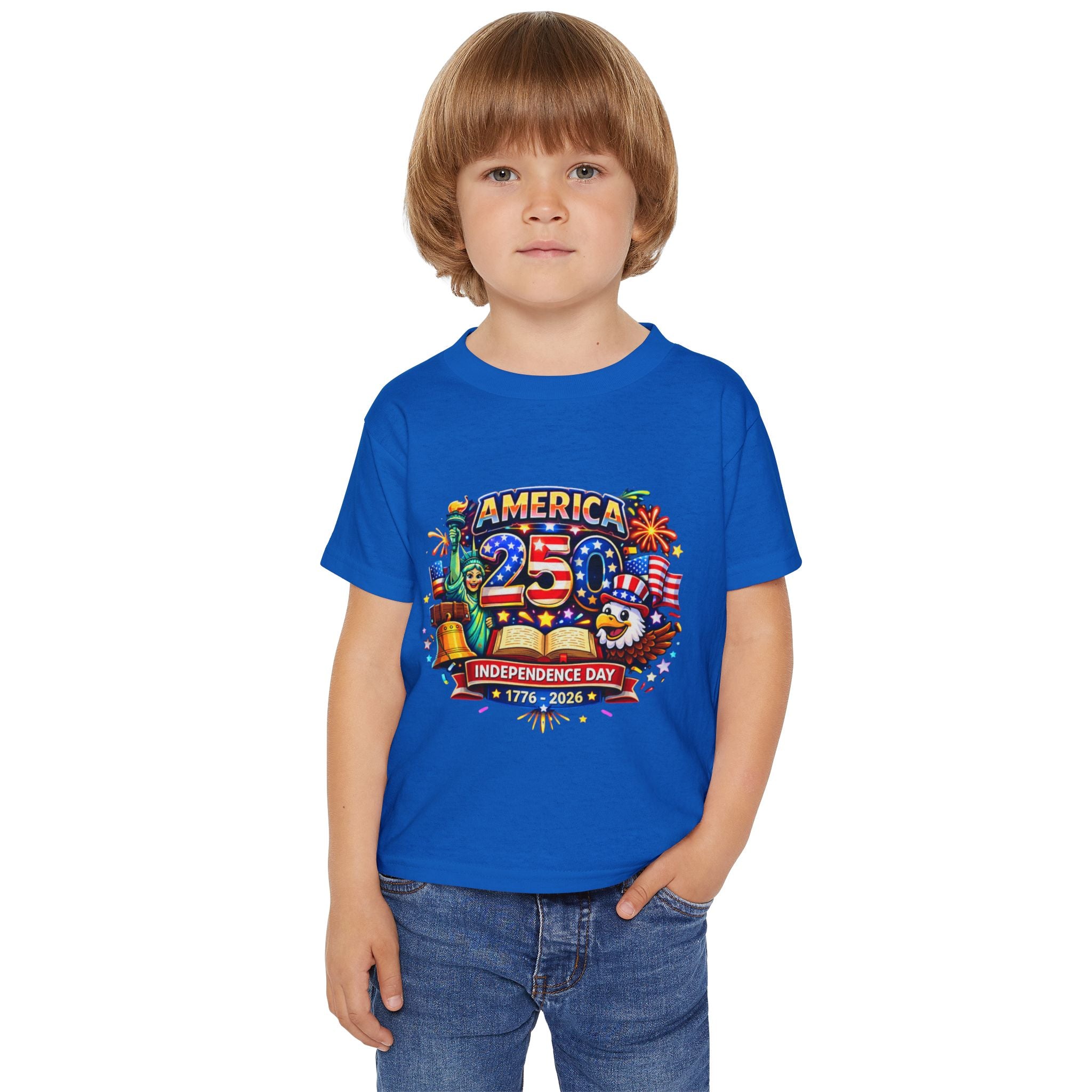 Child wearing a blue t-shirt with a colorful graphic design on a white background