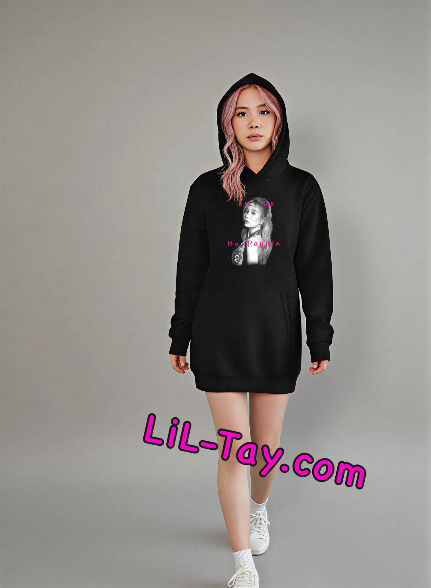 liltay wears a black bepoppin hoodie while standing 